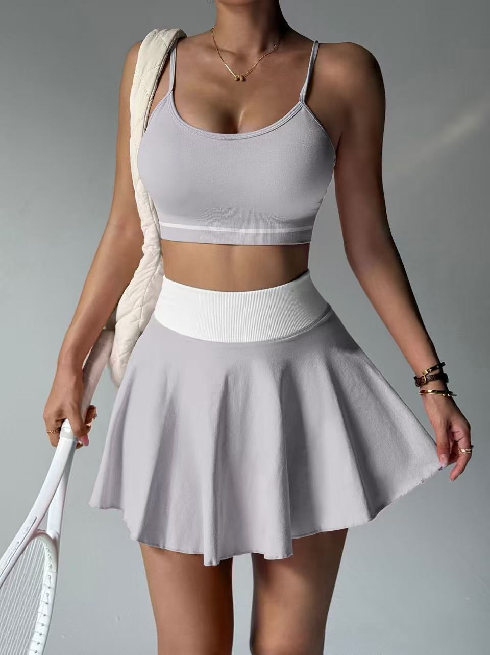 Conjunto de tenis y pádel gris perla
