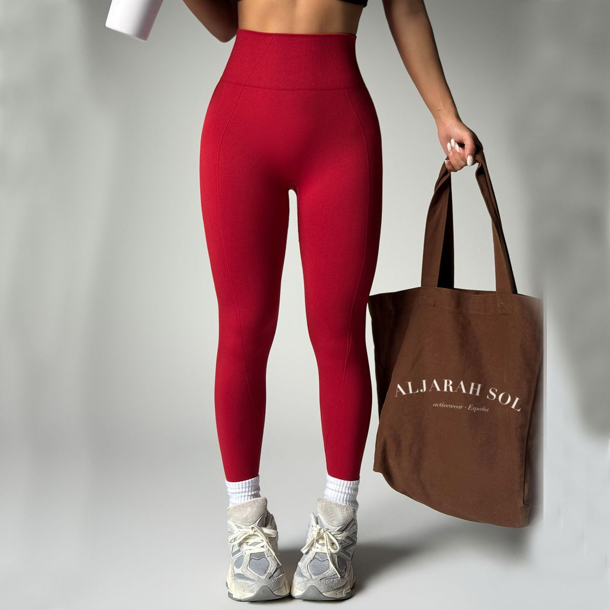 Leggings sin costuras rojo vino con bolso Aljarah Sol