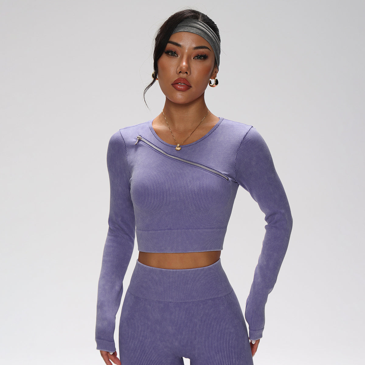 Conjunto deportivo violeta – top manga larga